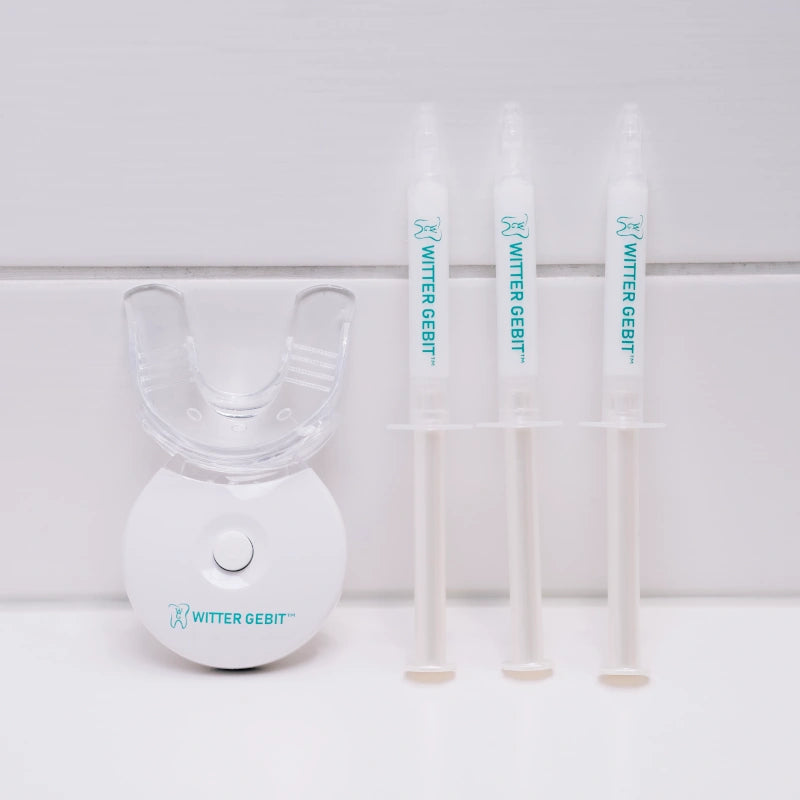 tandenbleekset op badkamer met bleekbitje en spuitjes