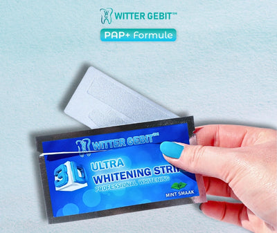 whitening strips in hand